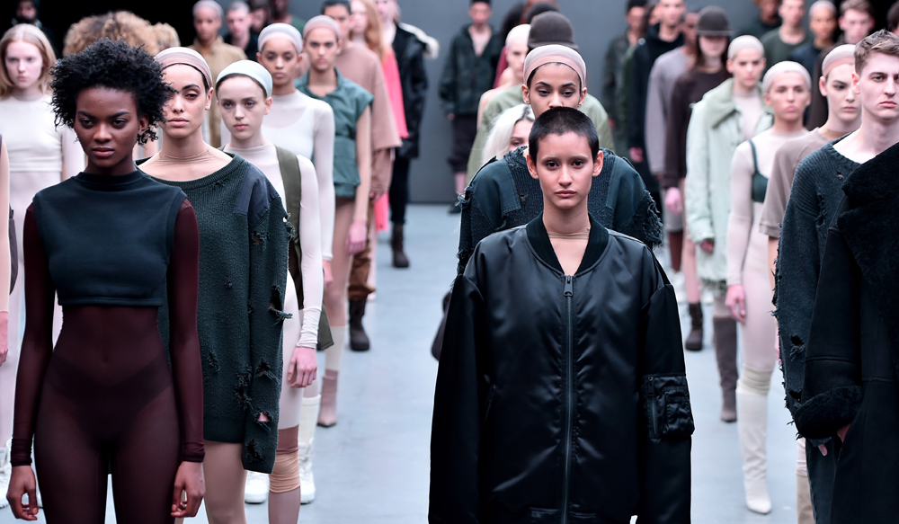 Instead of a traditional runway, models for the Kanye West x adidas Originals collection came out in full force and stood in rows like an army on a parade ground (Image via New York Post)