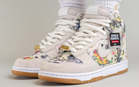 Side view of the high-top Supreme x Nike SB Dunk Rammellzee